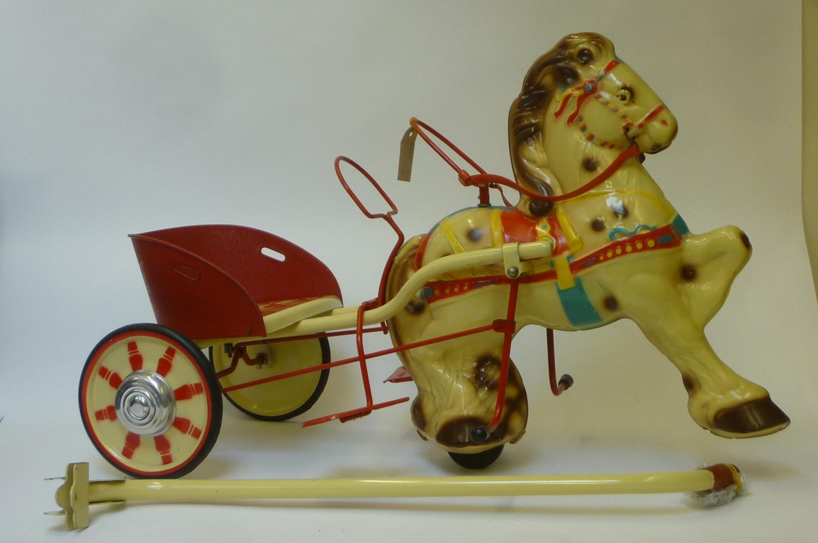 A Mobo "Pony Express" horse and carriage Image