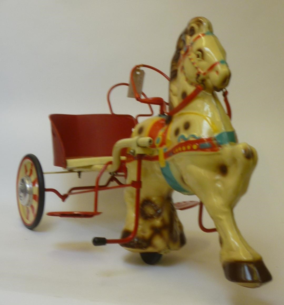 A Mobo "Pony Express" horse and carriage Image