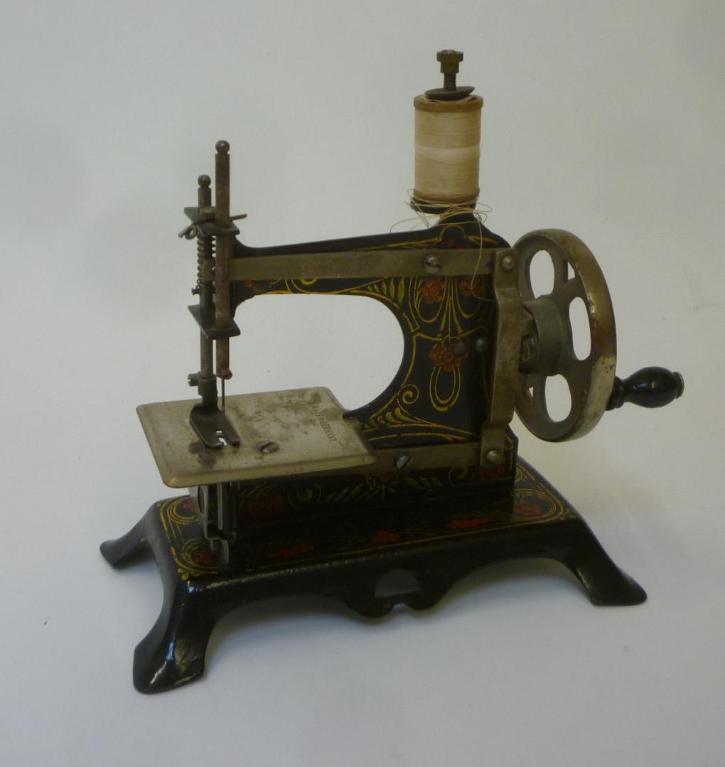 A German toy hand sewing machine Image