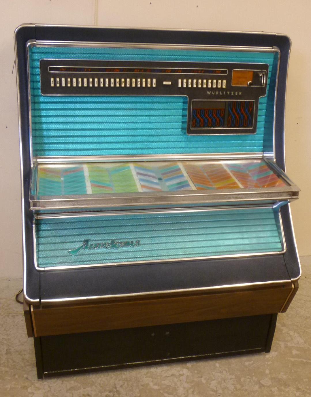 A Wurlitzer Americana electric Juke box in chromium plated edged metal case Image
