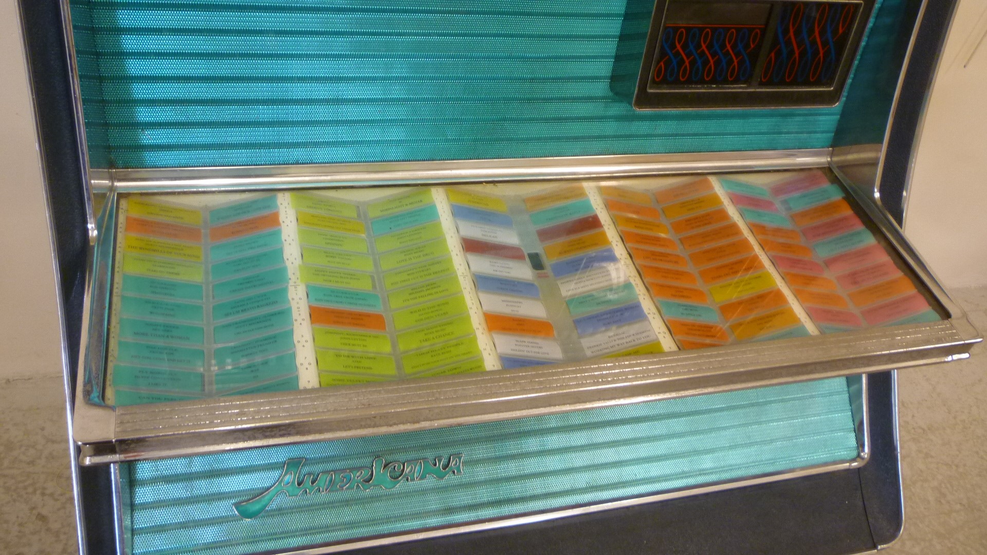 A Wurlitzer Americana electric Juke box in chromium plated edged metal case Image