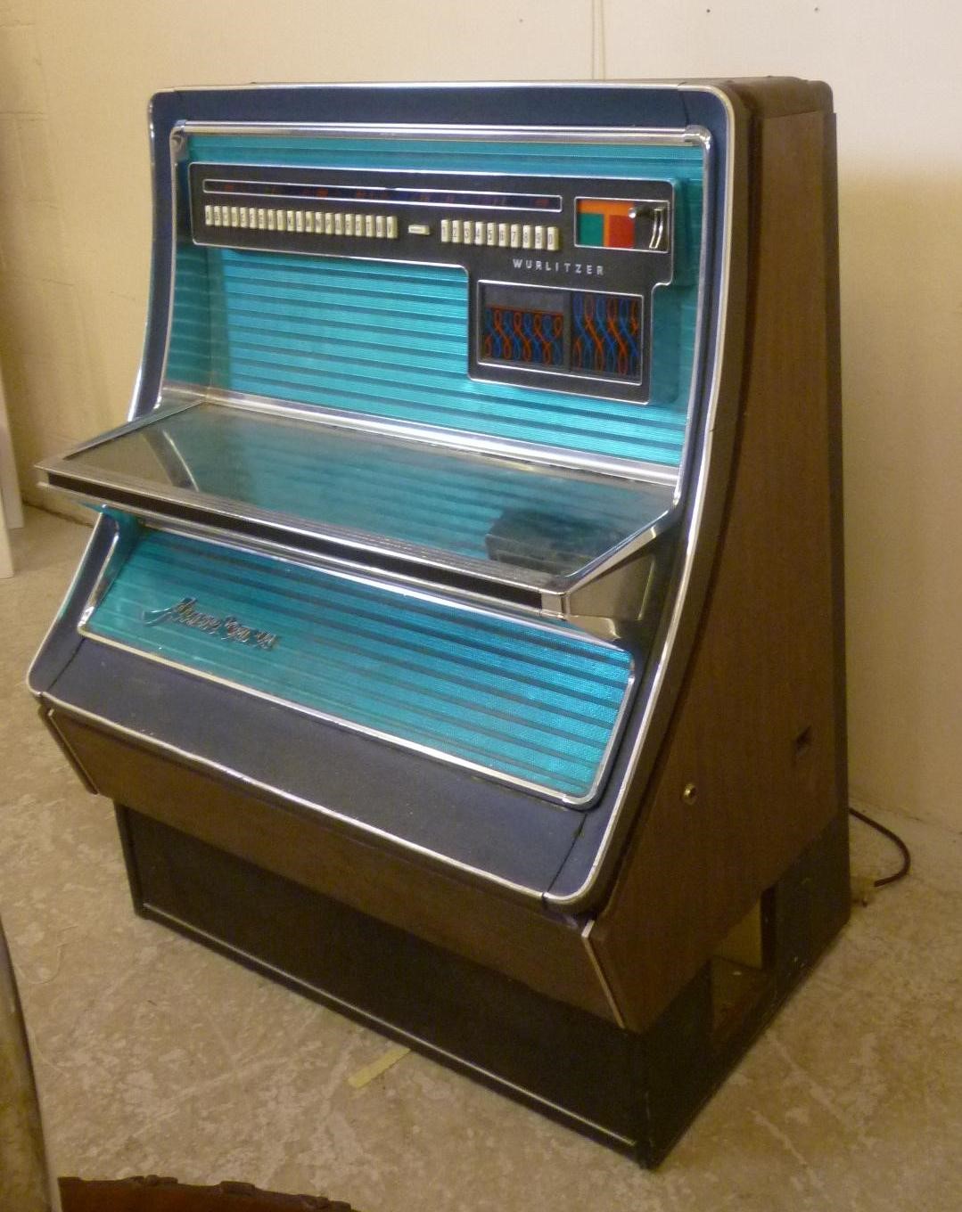 A Wurlitzer Americana electric Juke box in chromium plated edged metal case Image