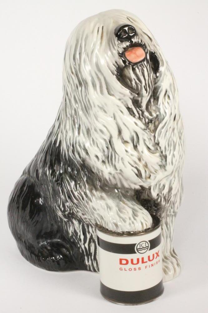 A Beswick pottery Dulux dog paint advertisement Image