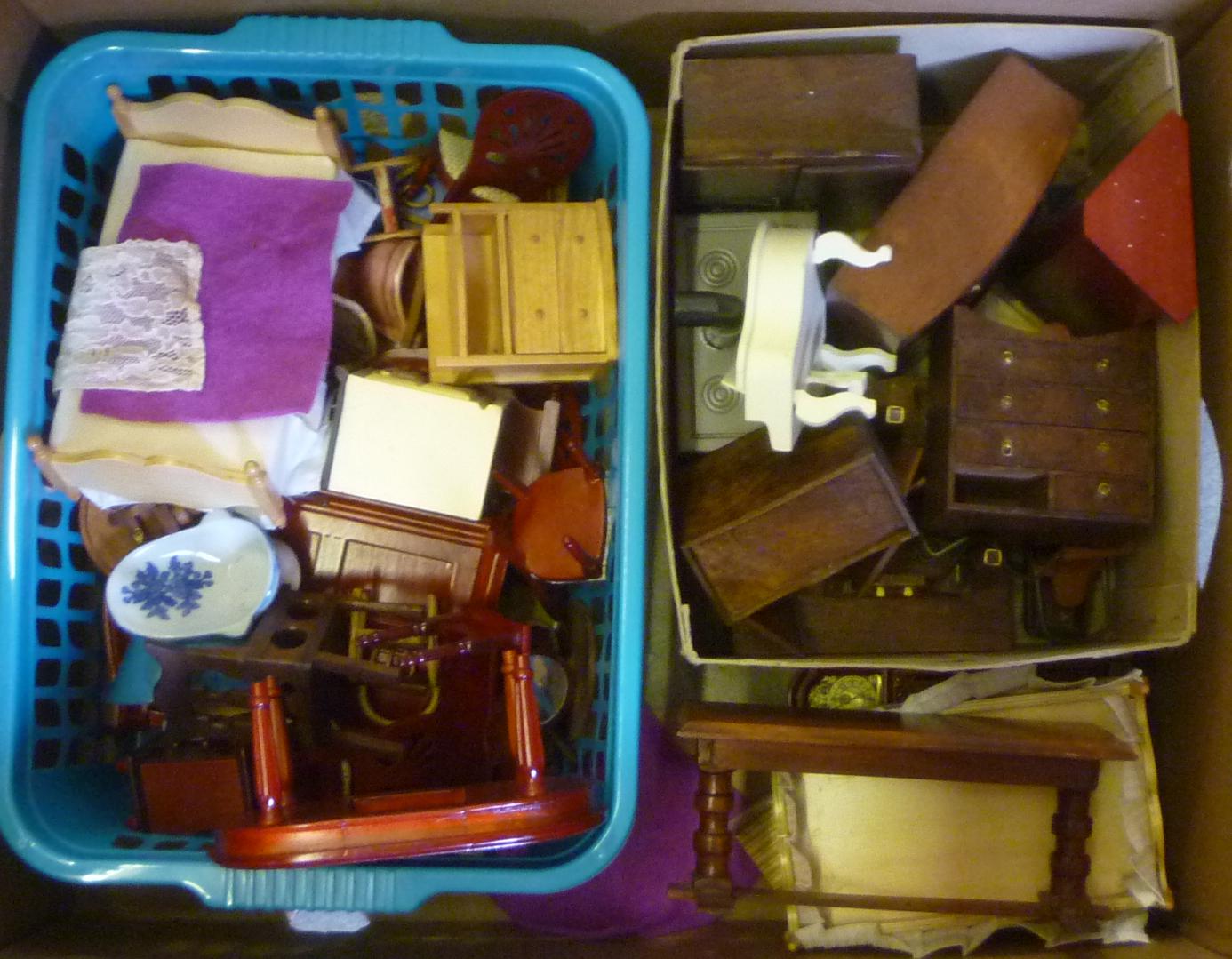 A collection of doll's house furniture mainly in wood Image