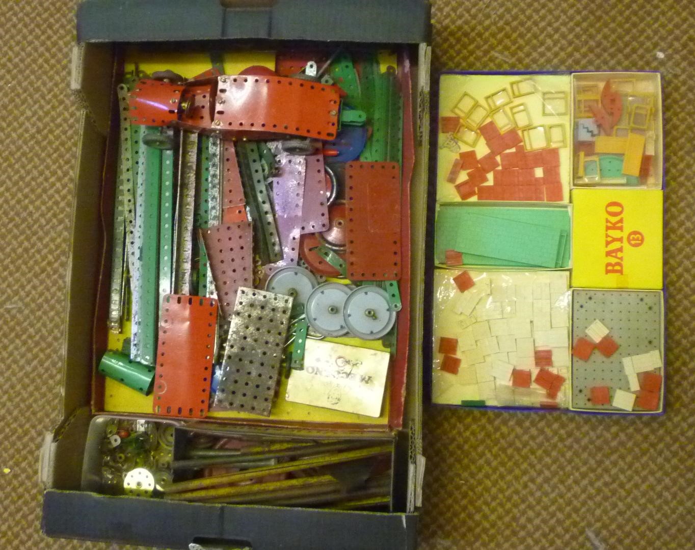 A Meccano Outfit No 5 with green and red parts and instruction book Image