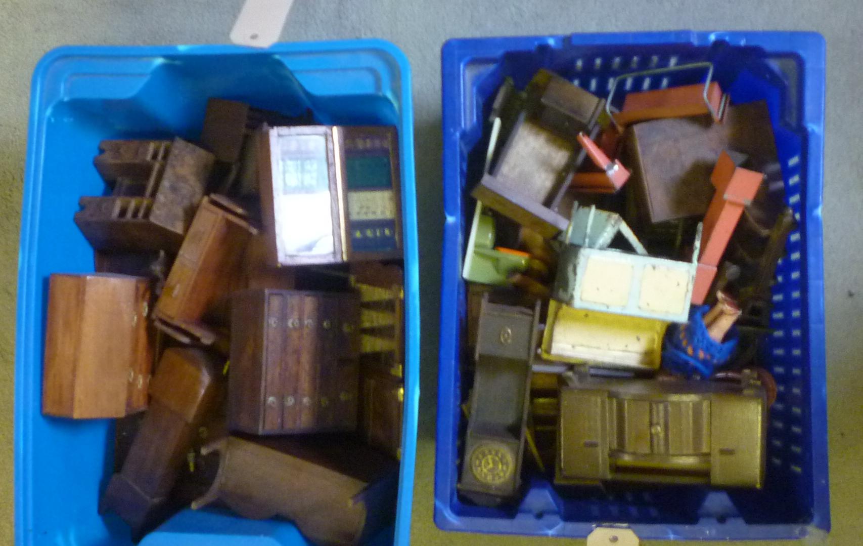 A collection of doll's house furniture in wood Image