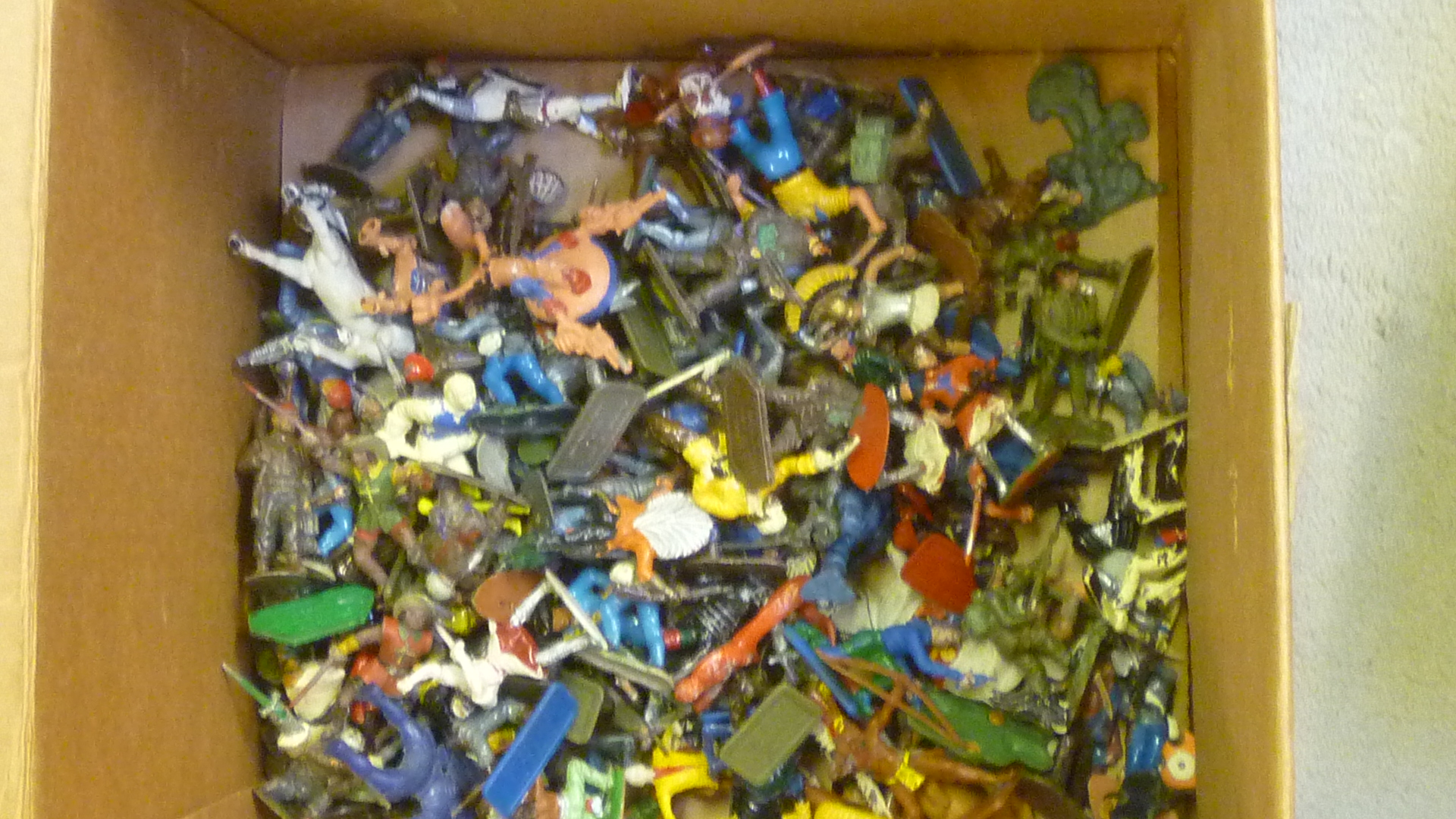 A quantity of plastic figures Image