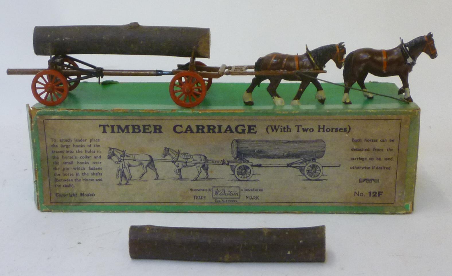 A Britains 12F Timber Carriage with two horses and load Image