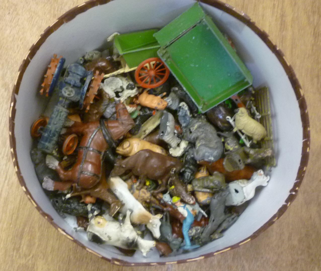 A quantity of Britains and other metal farm animals Image