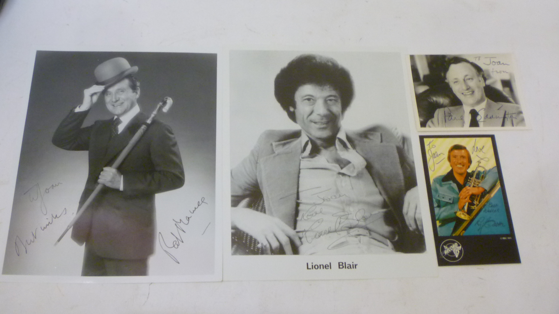 An album of autographed photographs comprising Paul Eddington Image