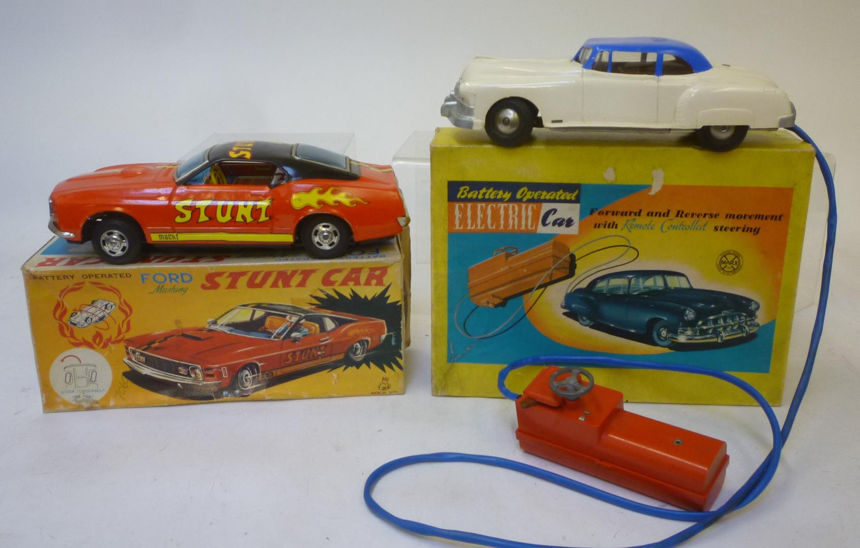 Eight tinplate vehicles comprising Japanese Ford Mustang stunt car Image