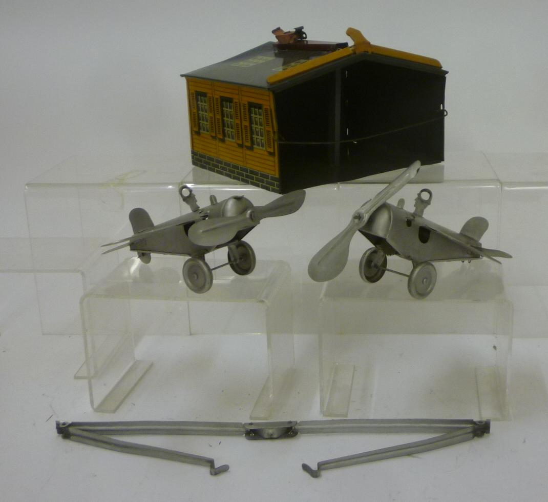 A tinplate aeroplane hanger Image