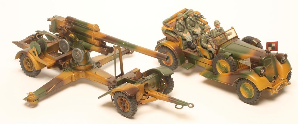 A German Second World War army staff car and mobile gun by Tipp & Co. Image