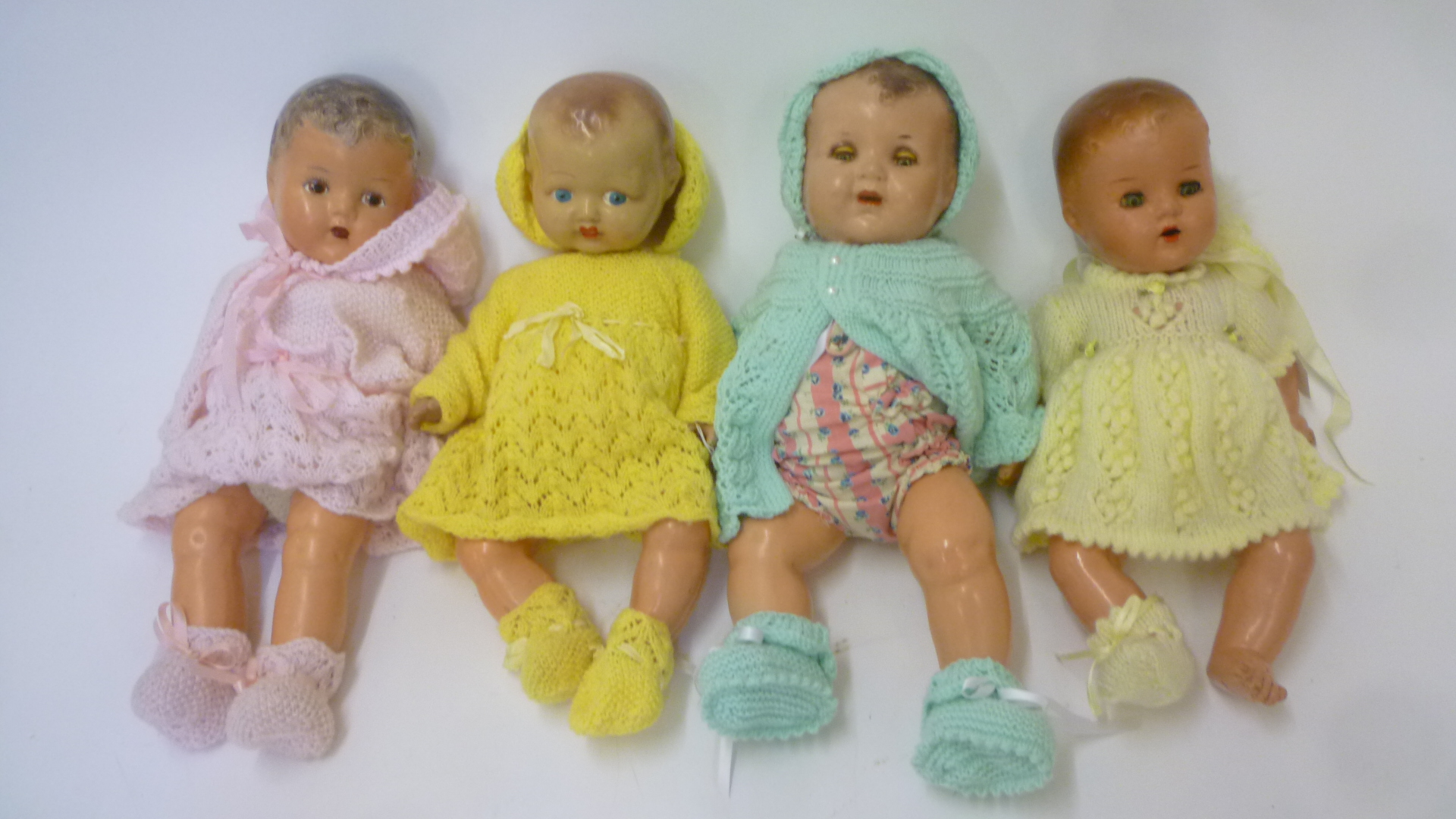 A composition doll with blue glass sleeping eyes Image