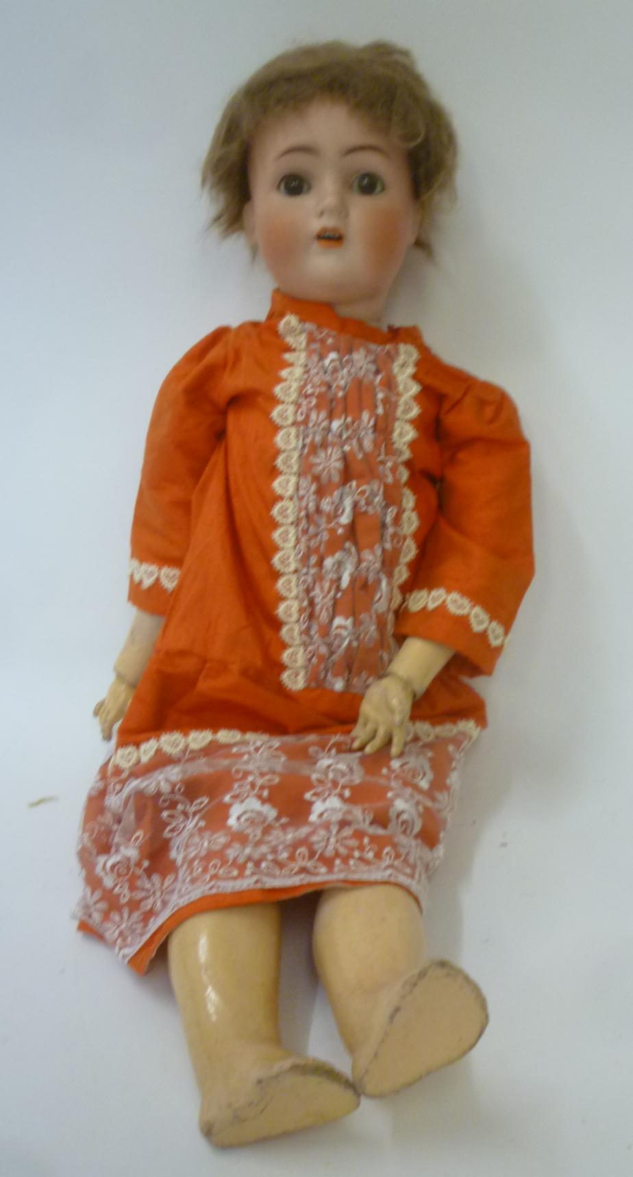 An Alt Beck & Gottschalk bisque head doll with brown glass sleeping eyes Image