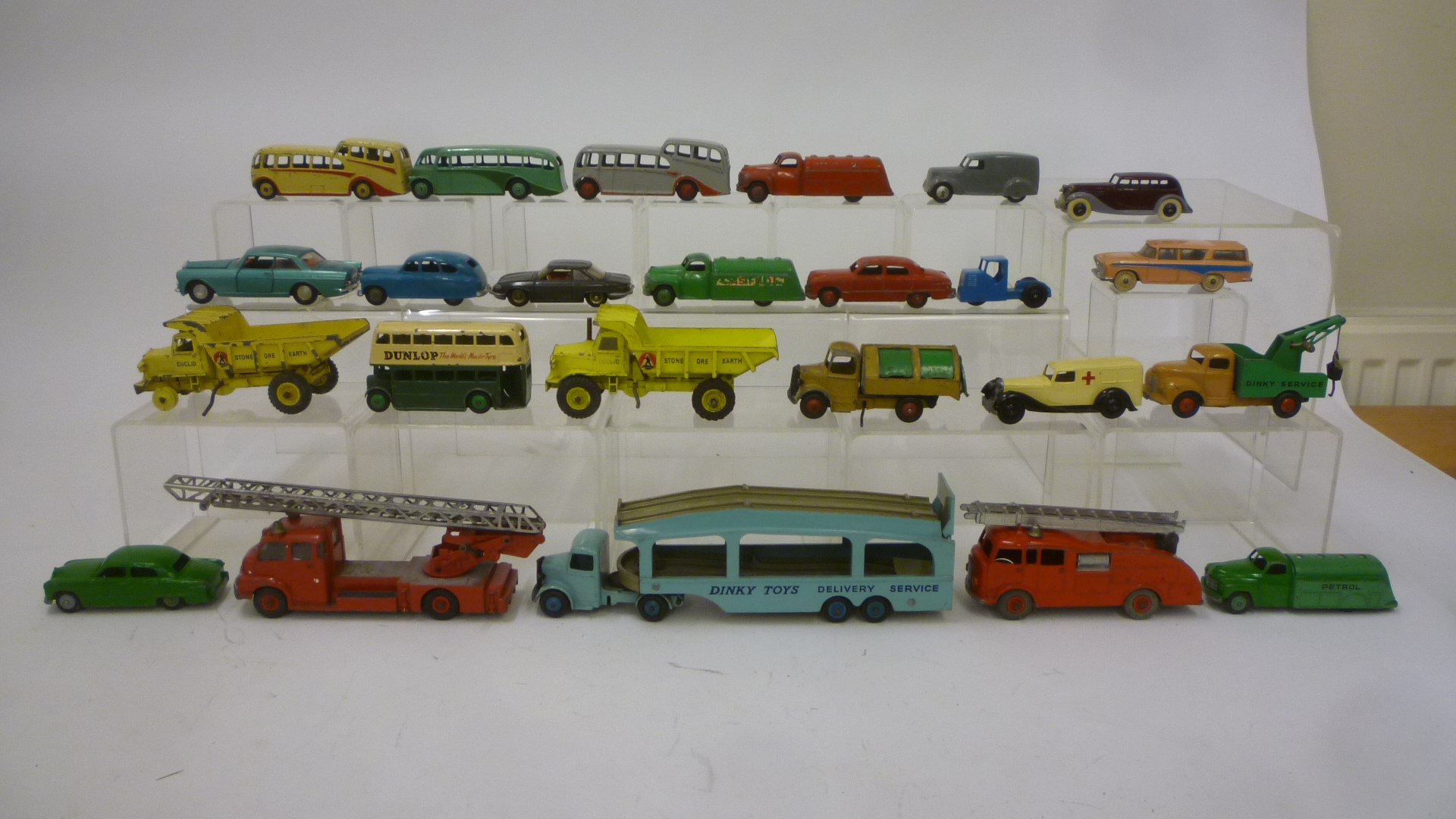 Twenty four Dinky models including some older cars Image