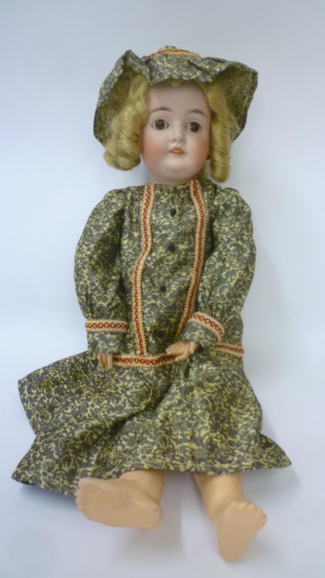 A Louis Wolf & Co bisque head doll "Queen Louise" Image