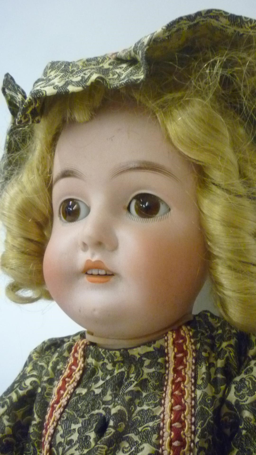 A Louis Wolf & Co bisque head doll "Queen Louise" Image