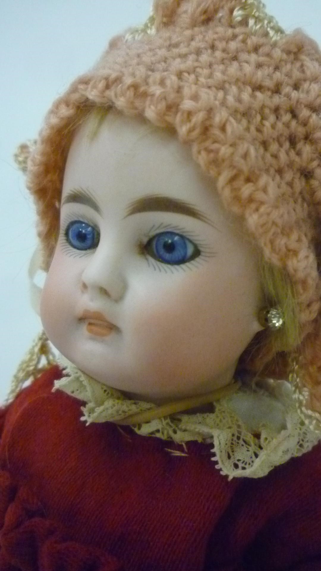 A Bahr & Proschild bisque head doll with fixed blue glass eyes Image