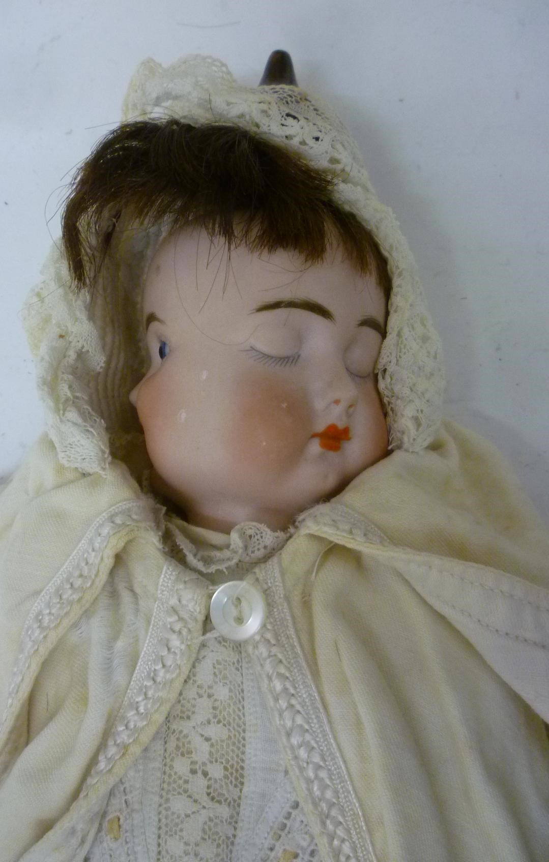 A German bisque head "Three Faces" doll with fixed blue glass eyes Image