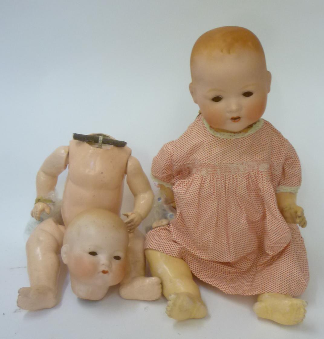 An Armand Marseille bisque head baby doll with sleeping glass eyes (to fix) Image