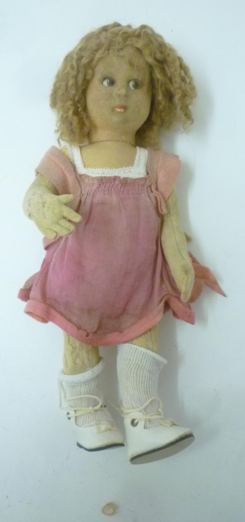 A Lenci felt doll with moulded painted face Image