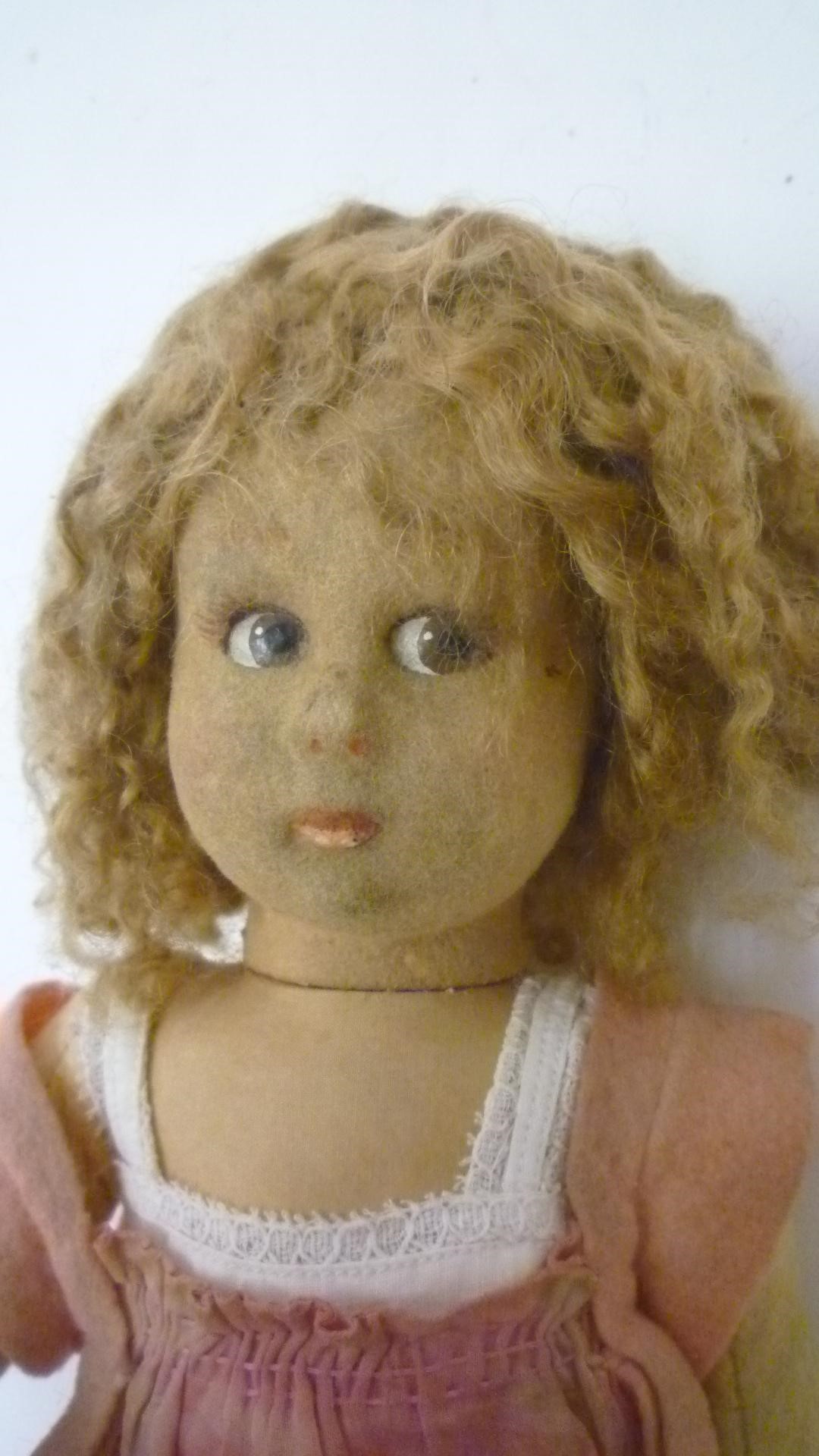 A Lenci felt doll with moulded painted face Image