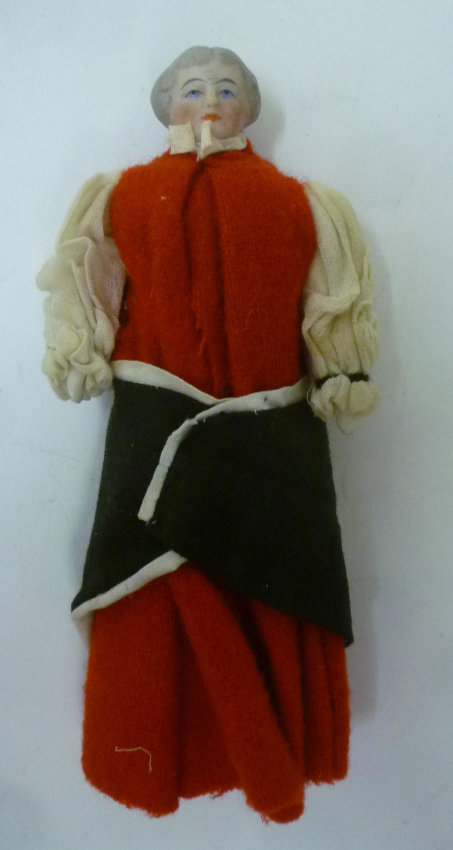 A dolls house male doll Image