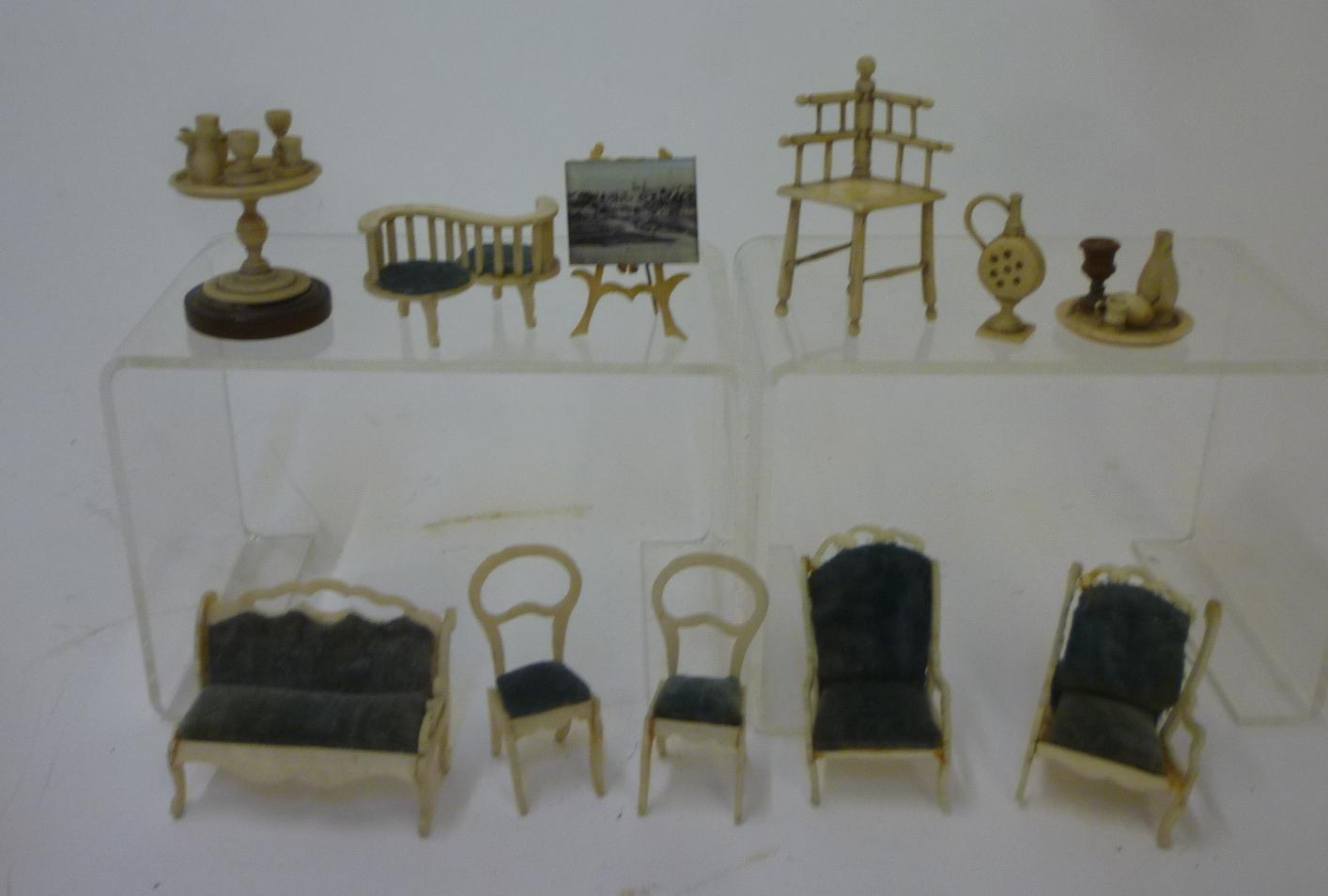 A collection of fret cut bone dolls house furniture including settee Image