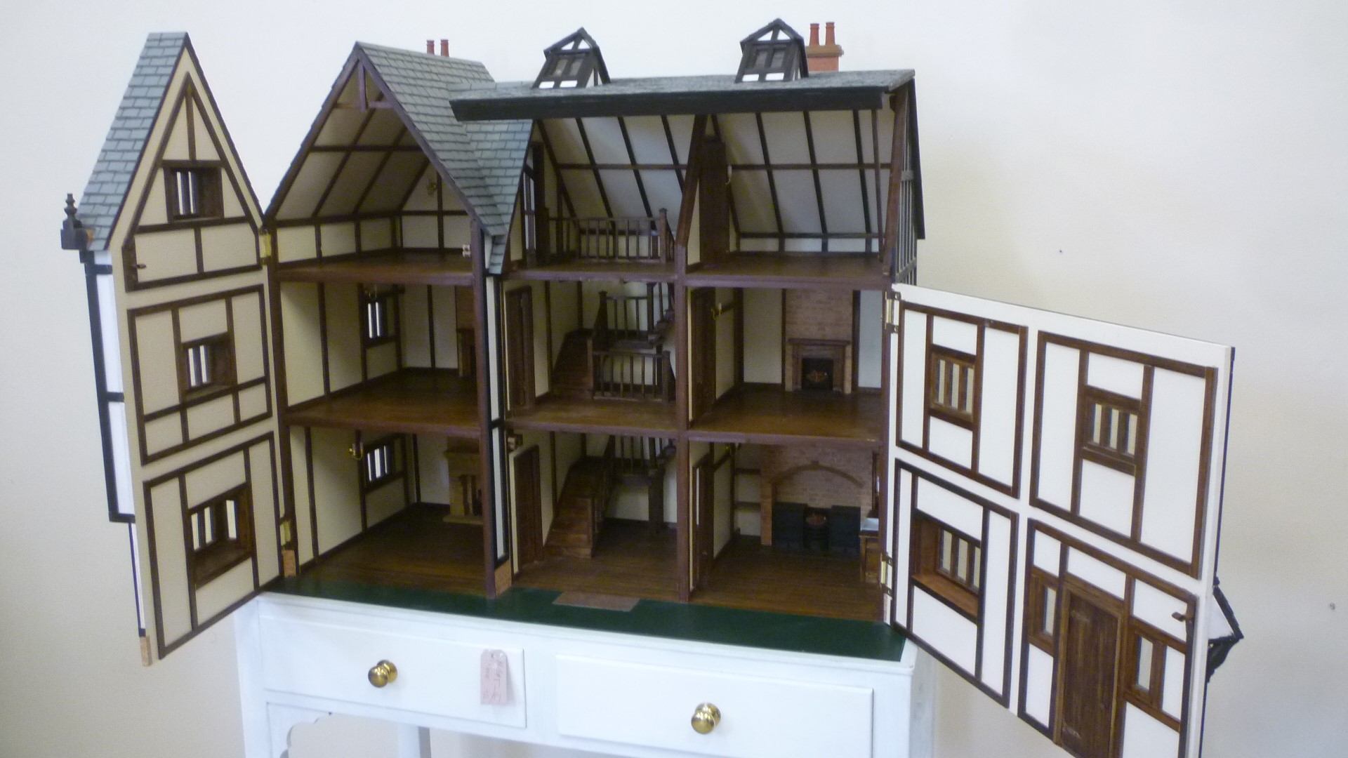 A cabinet made dolls house Image