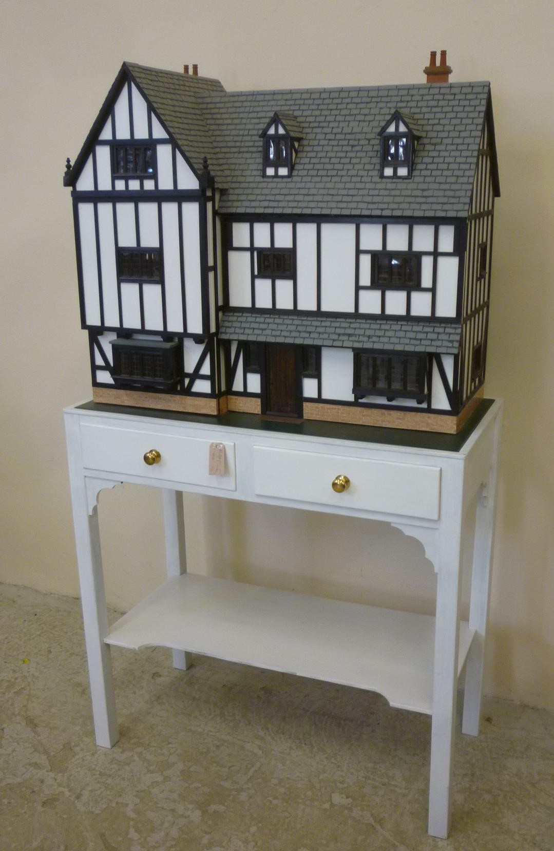 A cabinet made dolls house Image