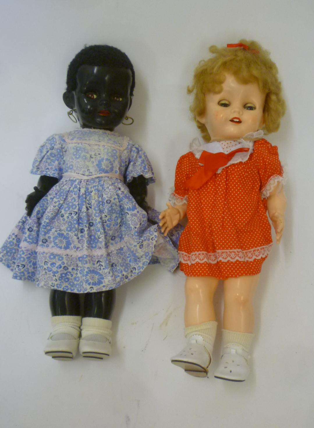 A Pedigree plastic walking black doll with sleeping eyes Image