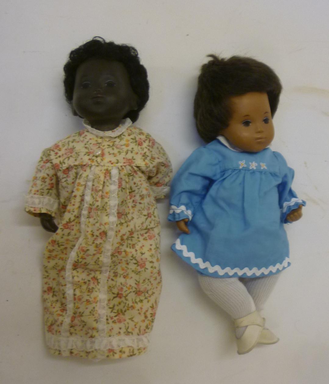 Two Sasha Baby dolls "Black Baby Little Flower" and "Baby Brown Hair" Image