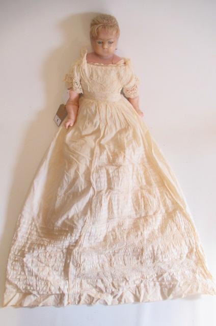 A wax shoulder head doll Image