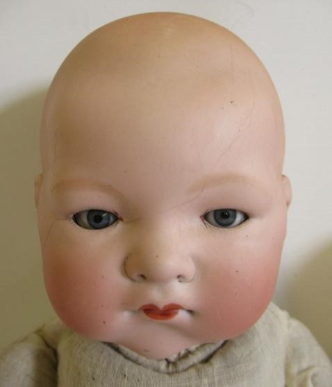 Three Armand Marseille bisque head dolls Image