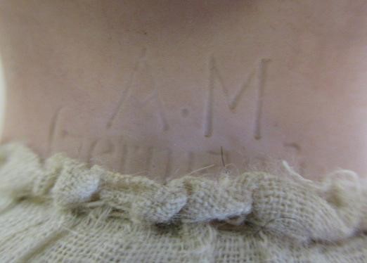 Three Armand Marseille bisque head dolls Image