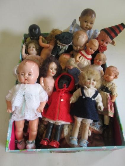 Two boxes of celluloid dolls Image