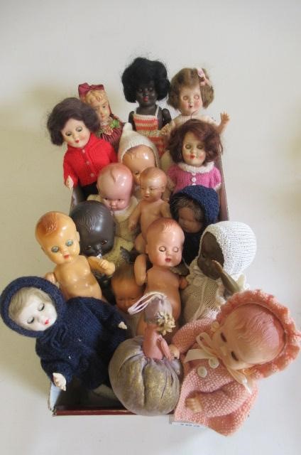 Two boxes of celluloid dolls Image