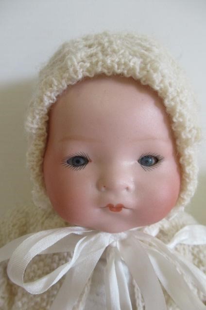 Five Armand Marseille bisque head dolls Image