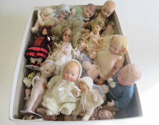 A large quantity of mid to late 20th century bisque dolls (Est. plus 21% premium inc. VAT) Image