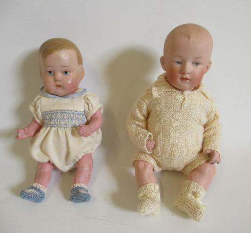 A Heubach solemn boy bisque socket head doll Image