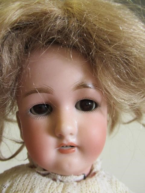 A Simon & Halbig bisque socket head doll Image