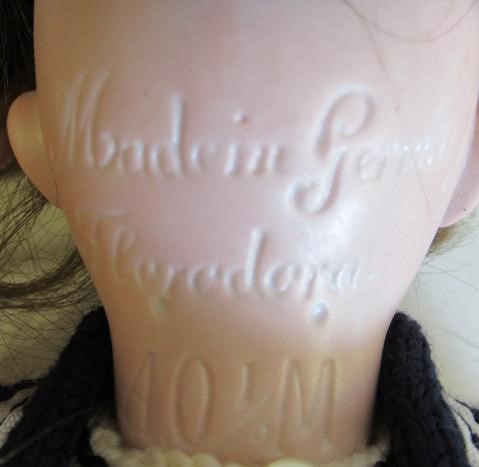 Three Armand Marseille bisque socket head dolls Image