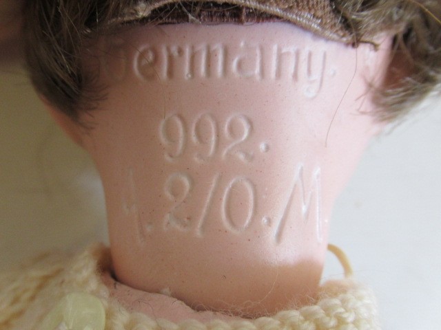 Three Armand Marseille bisque socket head dolls Image