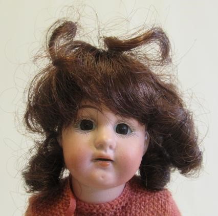 Four bisque head dolls Image