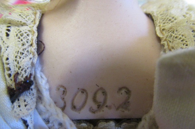 Four bisque head dolls Image