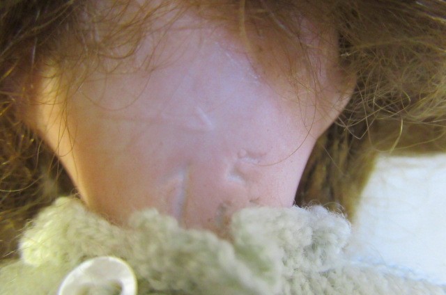 Four bisque head dolls Image