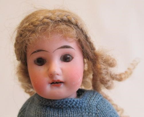 Four bisque head dolls Image