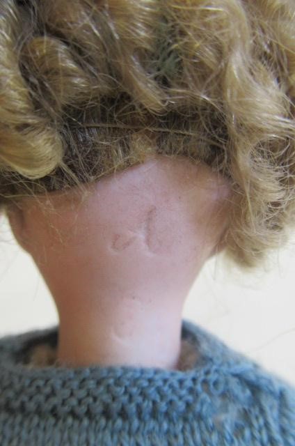 Four bisque head dolls Image