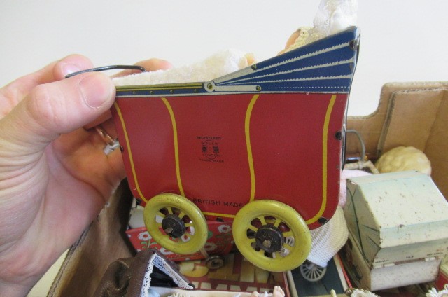 A quantity of dolls prams Image